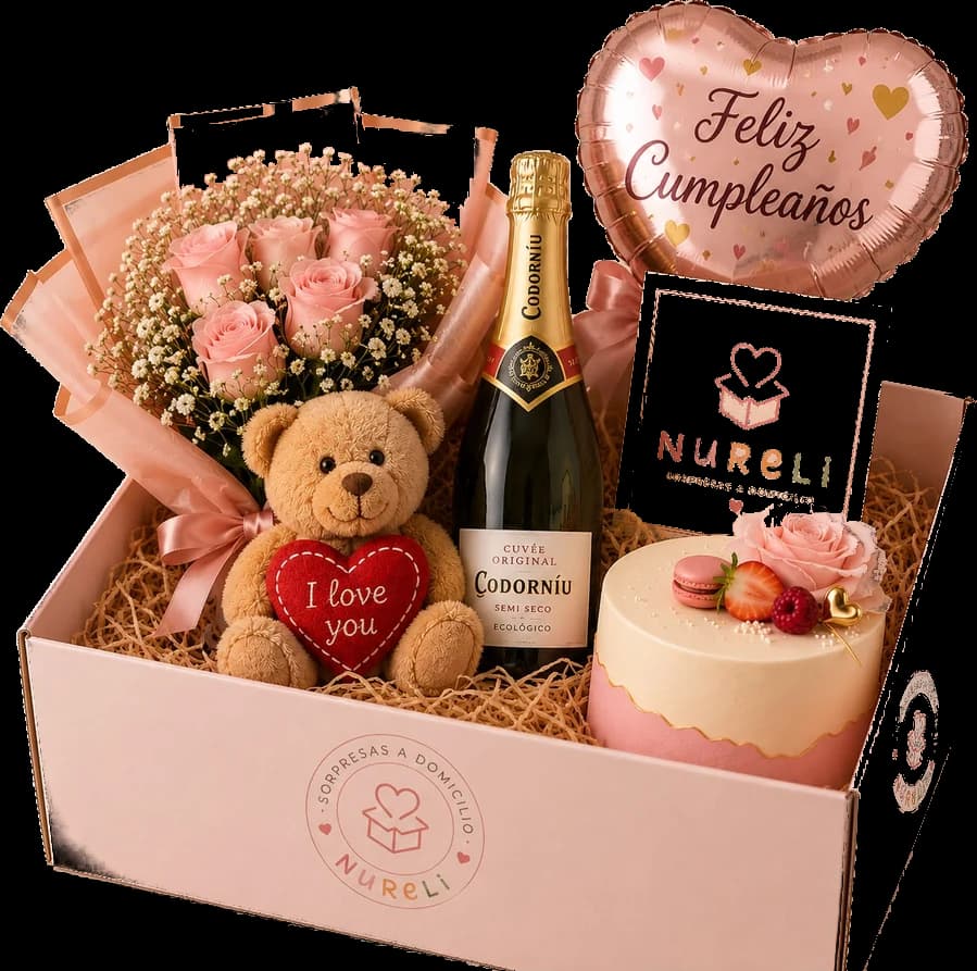 Caja Nureli con un ramo de rosas, un osito con un corazón, una botella de cava, una tarta y un globo de feliz cumpleaños